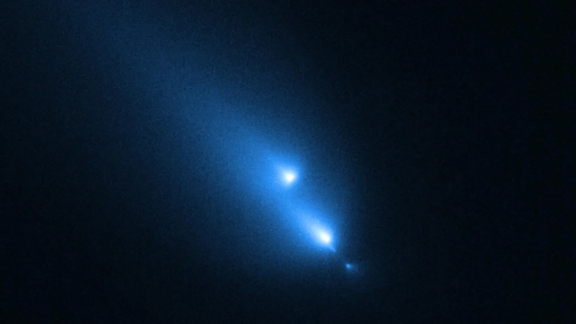 Shocking Discovery: Hubble Catches Comet K1 Breaking Apart
